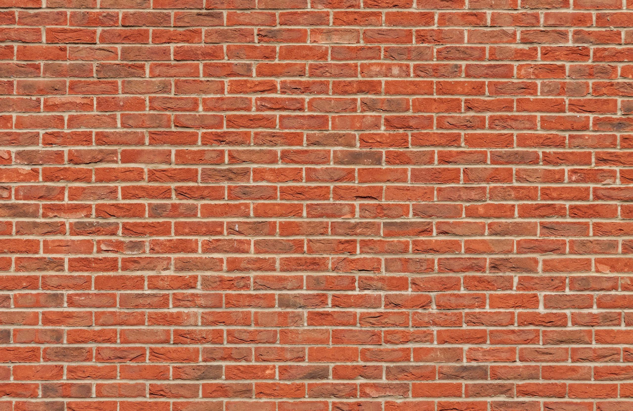 A classic red brick wall background, perfect for design and architectural themes.